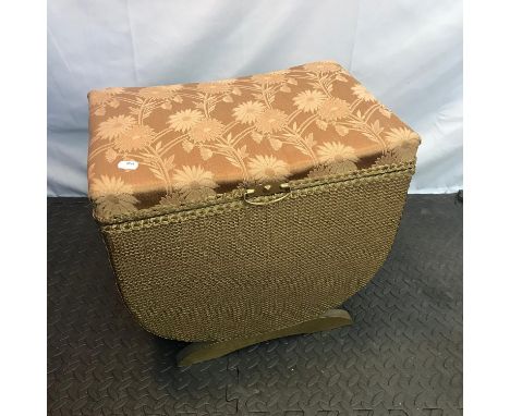 A Vintage Lloyd Loom style stool. Has a lift up top revealing slipper/ Linen storage. Very nicely painted and upholstered in 