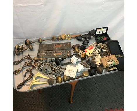 A Collection of antique and vintage door handles, art nouveau coat hangers, brackets and various screws etc. 