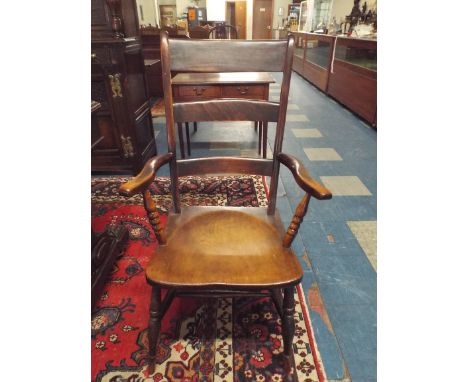 A 19th Century Elm Seated Ladder Back Armchair. 