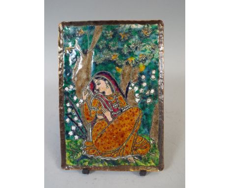 An Indian Copper and Enamel Plaque Depicting Seated Maiden Under Tree. Inscribed Verso 'With Compliments Larsen and Toubro, I
