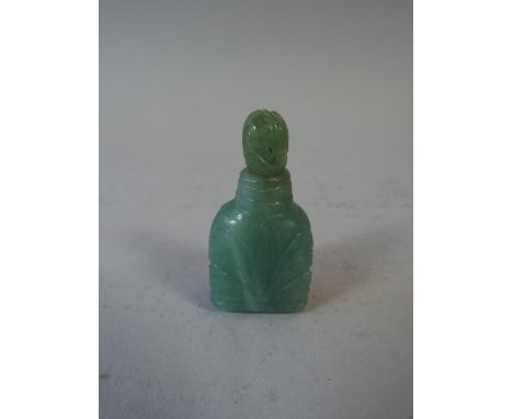 A Small Oriental Green Jade Opium Bottle. the Body Decorated in Relief with Leaves.