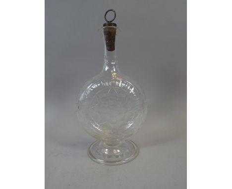 A 19th Century Handblown Glass Moon Flask Decanter with Cork and Silver Plate Stopper. The Body Cut with Starburst Decoration