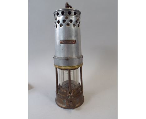 A Brass and Metal Miners Lamp. 58 1/2 x 60, British Made with Copper Name Plate for F.W.Kaye. 28cm High