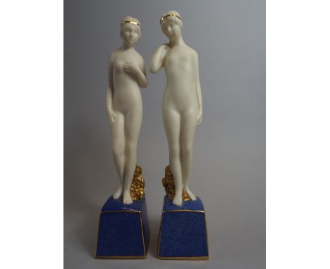A Pair of Royal Worcester Figurines, Standing Nude Maidens, on Blue and Gilt Plinths. No 2691 and 2692. Regd Nos 664094, 6640