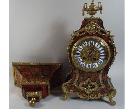 A French Ormolu Mounted Boulle Work Bracket Clock with Original Bracket. Clock 40.5cms, Bracket 17.5cm High
