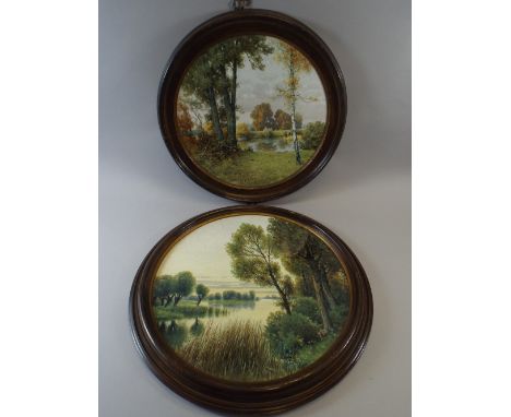 A Pair of Framed Porcelain Plaques both Decorated with Rural Landscapes and One Inscribed K. Siliuster, Lubenz. 40cm Diameter