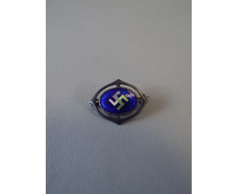 A Charles Horner Silver and Enamel Brooch with Swastika Motif.