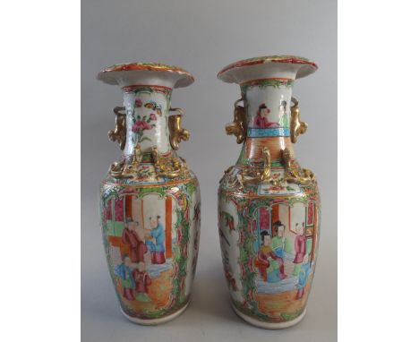 A Pair of Cantonese Ceramic Vases Decorated in Usual Coloured Enamels with Interior Scenes and Birds. Temple Dog Handles and 