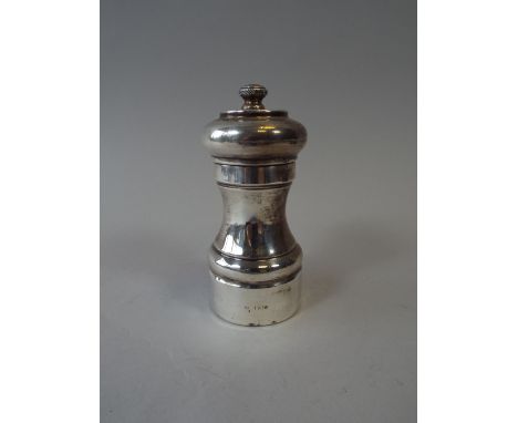 A Silver Pepper Grinder, 11cm High. London 1976.