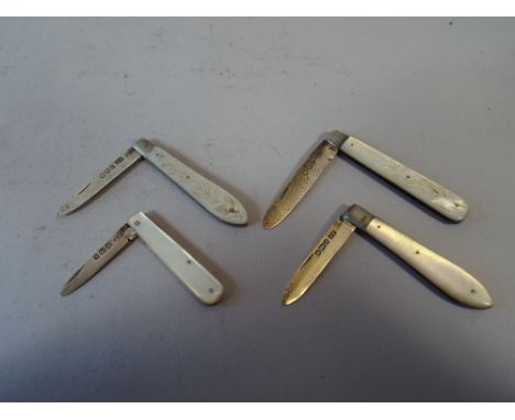 A Collection of Four Mother of Pearl Handled Silver Fruit Knives with Hallmarked Blades. 