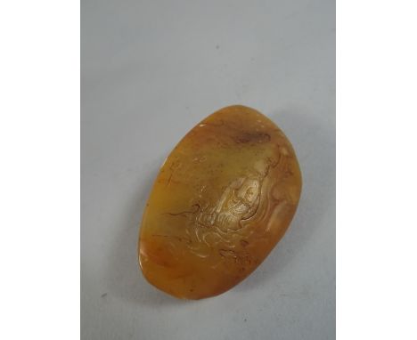 An Oriental Jade Boulder Carved Front and Back. 8cm Long. (With Oval Flaw)