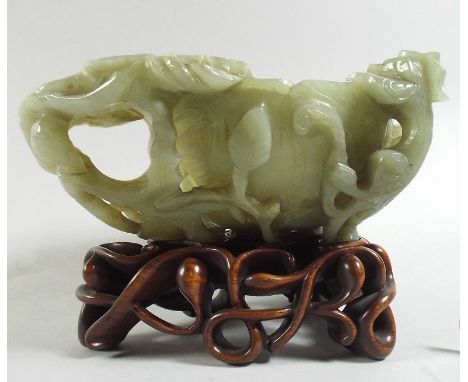 A Large and Impressive Green Jade Libation Cup on Finely Carved and Pierced Hardwood Stand. Very Good Quality. 15cm Long.