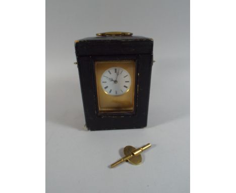 A Cased Gilt Brass French Carriage Clock by Rollin, Paris. With Etched Decoration to Frame and White Enamel Dial. 