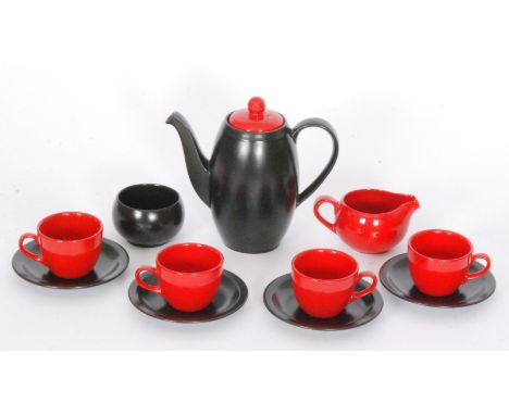 A 1950s Simpsons Pottery Vogue pattern teaset comprising teapot, four cups and saucers, milk jug and sugar bowl, all decorate