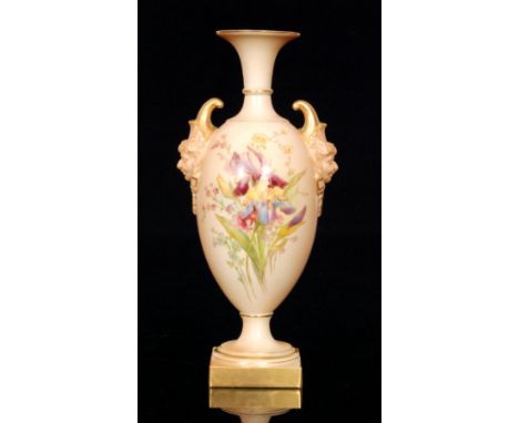 A Royal Worcester shape 1716 blush ivory vase decorated with iris and spring flowers with gilt detailing, the twin handles fo