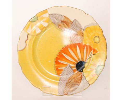 A 1930s Grays Pottery Art Deco plate decorated with large hand painted flowers over a speckled yellow ground, printed mark, p