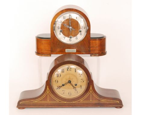 A 1940s Art Deco style inlaid mahogany cased mantle clock with eight day striking movement together with a similar wellington