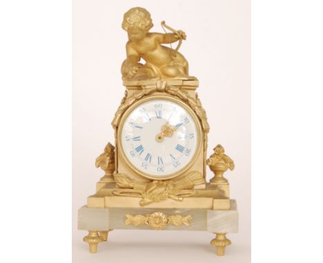 A 19th Century style French gilt mantle clock with painted dial surmounted with a cupid and bow on an onyx base, height 24cm