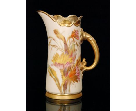 A Royal Worcester shape 1229 blush ivory water jug decorated with stylised flowers and foliage, the handle and border edge wi