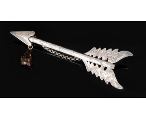 A late 19th Century Scottish white metal kilt brooch designed as an arrow, stamped to reverse, length 10.5cm,makers mark Hill