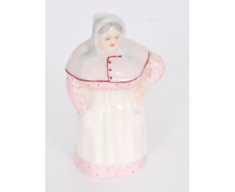A Royal Worcester candle snuffer modelled as The French Cook (also known as The Farmer's Wife), green printed mark with date 