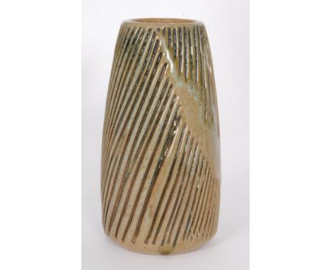 A Poole Pottery Atlantis A20/3 vase decorated by Jenny Haigh with wrythen carved lines glazed in olive green, impressed marks