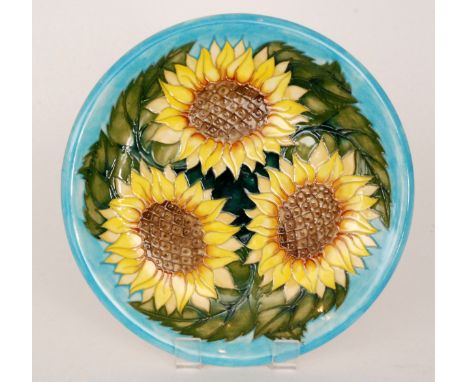 A large Moorcroft Pottery charger decorated in the Sunflower pattern designed by Sally Tuffin, impressed and painted marks, d