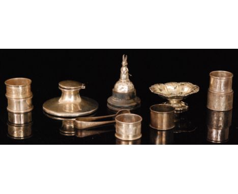 A small parcel lot of hallmarked silver items to include a capstan inkwell, six various napkin rings, a pedestal bon bon dish