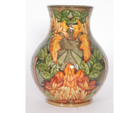 A Moorcroft Pottery vase decorated in the Flame of the Forest pattern designed by Philip Gibson, printed and painted marks, m