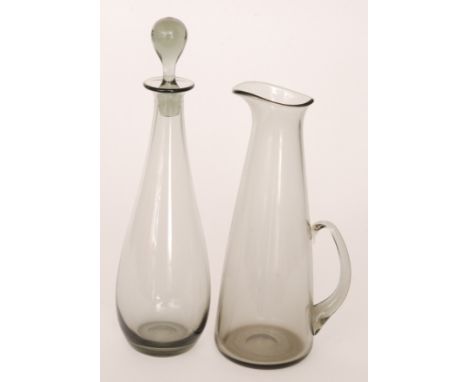 A later 20th Century Whitefriars decanter of slender bottle form with a spherical stopper in a smoke grey finish, height 39cm