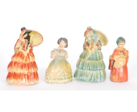 Four Wade 1930s Art Deco cellulose figures designed by Jessie van Hallen comprising two entitled Sunshine 1 in two colourways