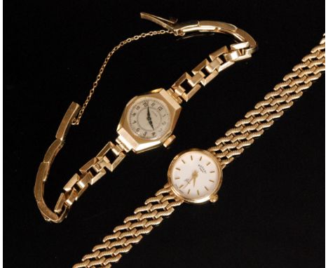 A 1990s hallmarked 9ct Rotary lady's wrist watch, circular white dial with baton markers, all to integral mesh bracelet, comp