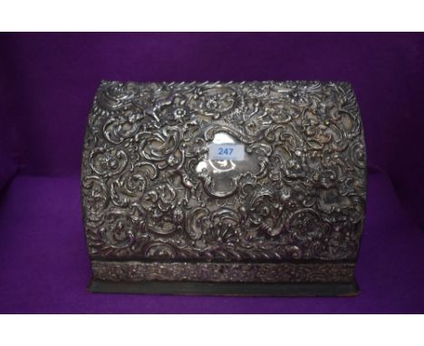 An ornate late Victorian letter or stationary case having HM silver embossed decoration
some damage to centre and too another