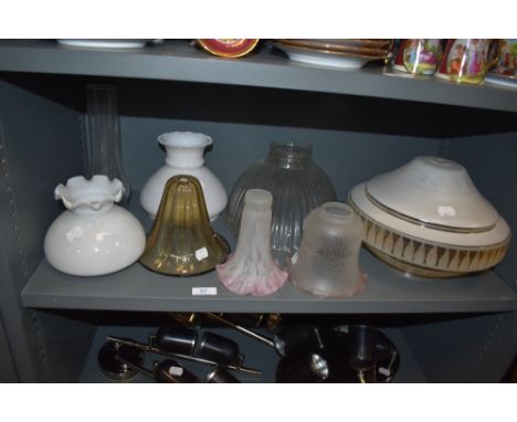 A selection of various light shades including art deco designs and mid century