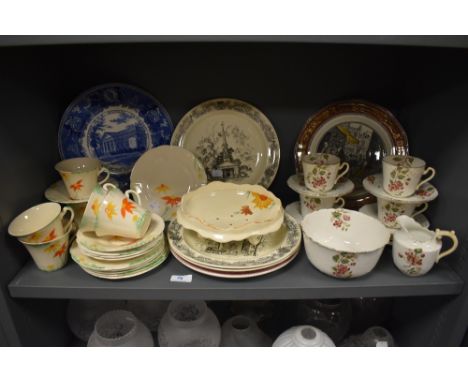 A mixed lot of ceramics including cheerful art deco tea cups and saucers and plates with orange,yellow and green floral patte