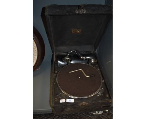 An early wind up record player or gramophone by HMV