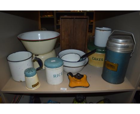 A large assortment of vintage enamel and kitchenalia including a rather large Thermos flask,handled enamel measures,mixing bo