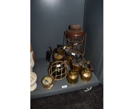 A selection of vintage brass including storm lamp, blow torches,atomisers, pressure gauge and more.