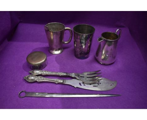 A selection of silver plated ware including napkin rings jug pinch bowl fish servers etc