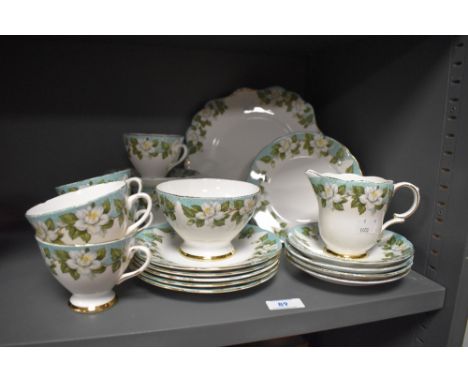A collection of vintage Montrose Gladstone having orange blossom and  green braid effect banding with gilt detailing, cups an