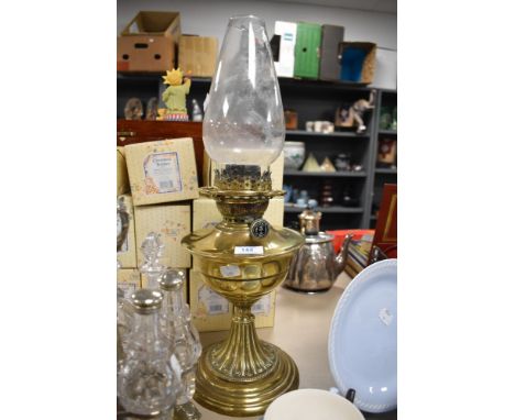 An early 20th century brass oil lamp.