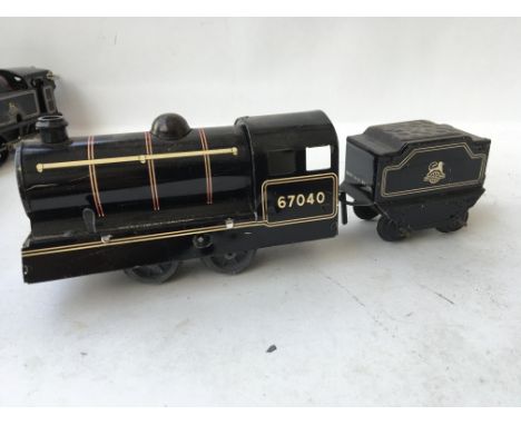 A made in GT Britain , British railways tinplate engine and tender 0 Gauge