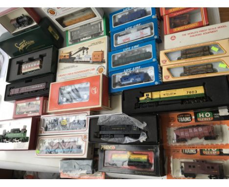 A collection of various makes of 00 gauge railway including Boxed Locomotives, carriages and rolling stock by Bachmann, Mantu