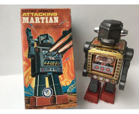 A boxed battery operated , Attacking Martian Robot