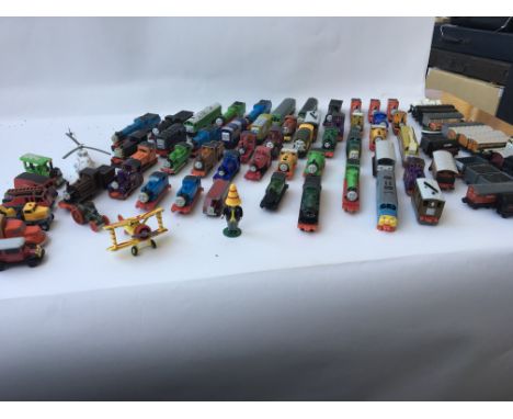 A large collection of playworn Thomas the Tank engine diecast including Thomas and all his friends