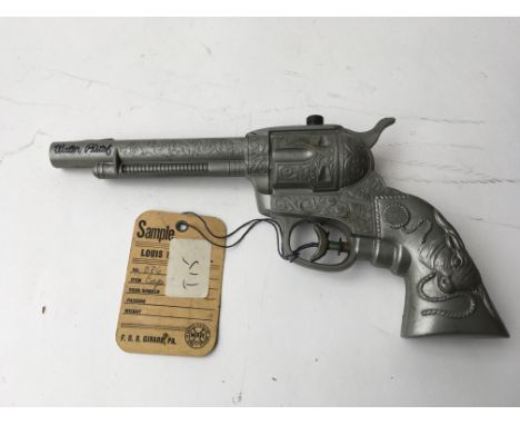A Louis Marx Water pistol Sampler , plastic,