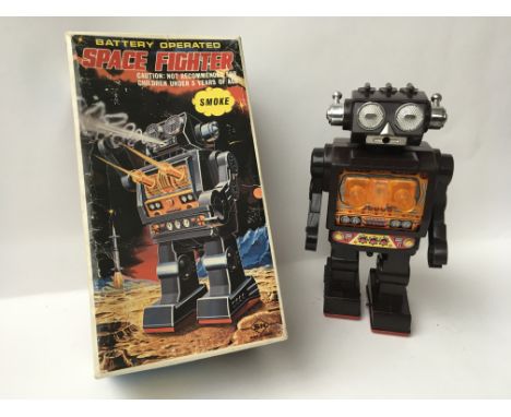 A Japanese boxed, plastic, battery operated, Space Fighter Robot