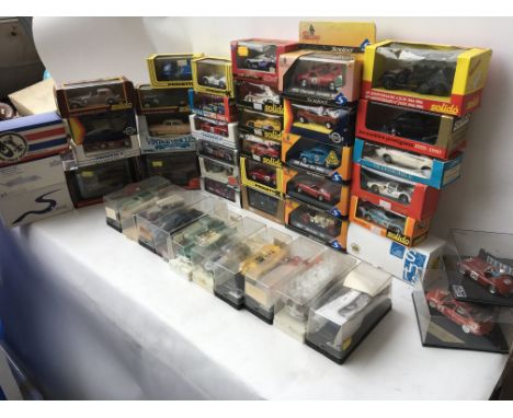 A collection of boxed diecast in Perspex display boxes including , Solido, EFE, Progetto k, etc