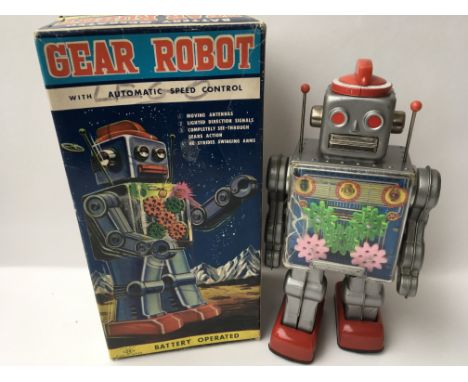 A Japanese boxed, tinplate and plastic, battery operated, Gear Robot , has damage to screen