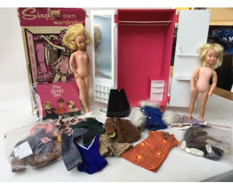 A boxed Sindy dolls wardrobe with a Patch and Sindy dolls also including a quantity of original clothes and accessories